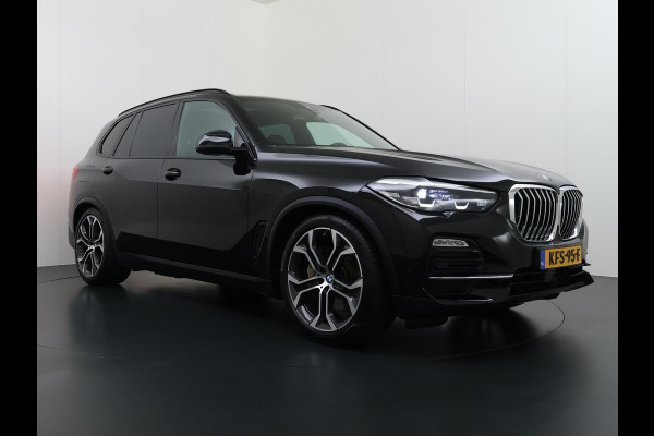 BMW X5 xDrive45e High Executive VAN: 55.900,- VOOR: 51.877,- UW WKVOORDEEL: 4.023,- | HARMAN KARDON| ELEK. TREKHAAK|ELEK. SCHUIF/ KANTELDAK| ACHTERBANK VERWARMING| HEAD-UP DISPLAY| DODE HOEK SENSOR| CAMERA| ACHTERAS BESTURING