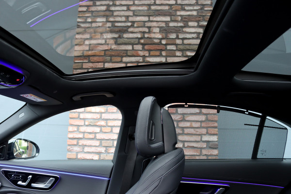 Mercedes-Benz E-Klasse 400 e 4MATIC AMG Line | Hyperscreen | Luchtvering | Achterasbesturing | Distronic+ | HUD | Massage | Burmester | Nappa Leder | Trekhaak | Vlakkenverwarming | Stoelventilatie | Soft-Close |