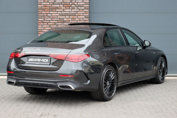 Mercedes-Benz E-Klasse 400 e 4MATIC AMG Line | Hyperscreen | Luchtvering | Achterasbesturing | Distronic+ | HUD | Massage | Burmester | Nappa Leder | Trekhaak | Vlakkenverwarming | Stoelventilatie | Soft-Close |