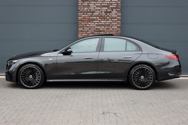 Mercedes-Benz E-Klasse 400 e 4MATIC AMG Line | Hyperscreen | Luchtvering | Achterasbesturing | Distronic+ | HUD | Massage | Burmester | Nappa Leder | Trekhaak | Vlakkenverwarming | Stoelventilatie | Soft-Close |