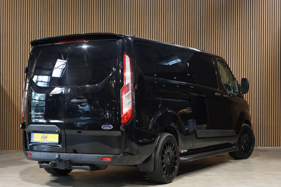 Ford Transit Custom 300 2.0 TDCI L2H1 Raptor Edition | Camera | CarPlay | Trekhaak | Stoelverwarming | Treeplanken | Spoilerkit | PDC V+A | Nieuwe APK