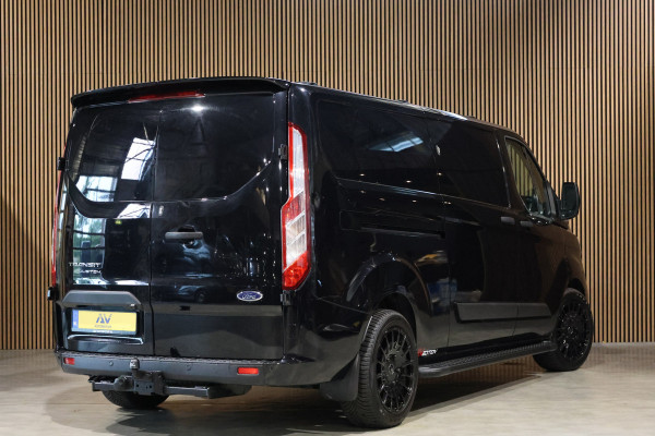 Ford Transit Custom 300 2.0 TDCI L2H1 Raptor Edition | Camera | CarPlay | Trekhaak | Stoelverwarming | Treeplanken | Spoilerkit | PDC V+A | Nieuwe APK