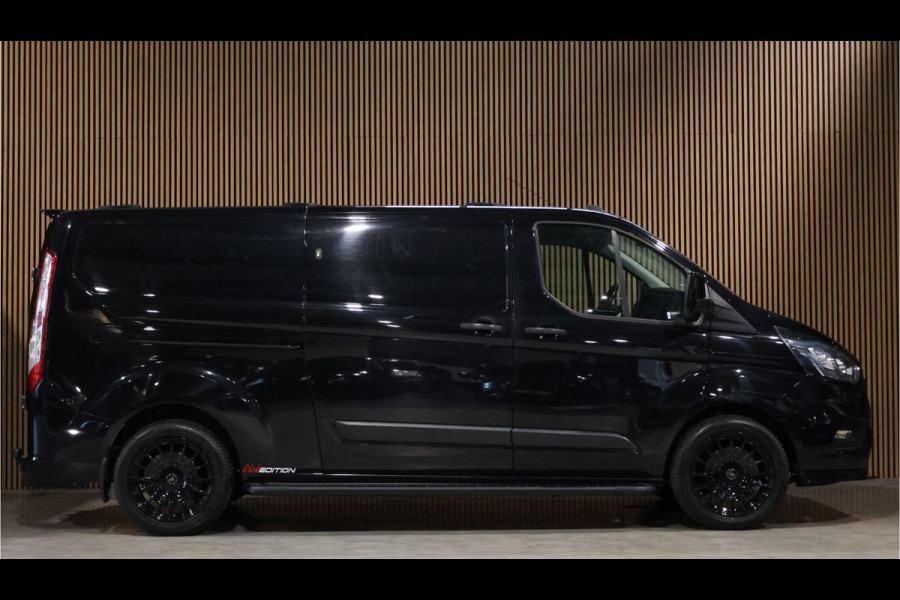 Ford Transit Custom 300 2.0 TDCI L2H1 Raptor Edition | Camera | CarPlay | Trekhaak | Stoelverwarming | Treeplanken | Spoilerkit | PDC V+A | Nieuwe APK
