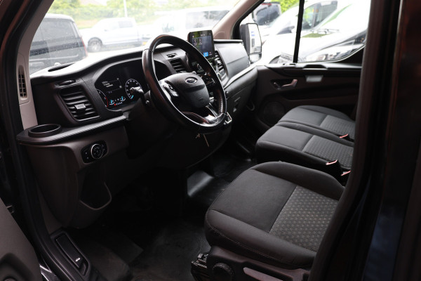 Ford Transit Custom 300 2.0 TDCI L2H1 Raptor Edition | Camera | CarPlay | Trekhaak | Stoelverwarming | Treeplanken | Spoilerkit | PDC V+A | Nieuwe APK