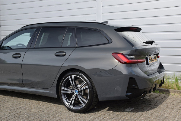 BMW 3 Serie Touring 330e*M-Pakket*Dak*Trekhaak*140Dkm*Keyless*2023*Dravit Grau*INDIVIDUAL*