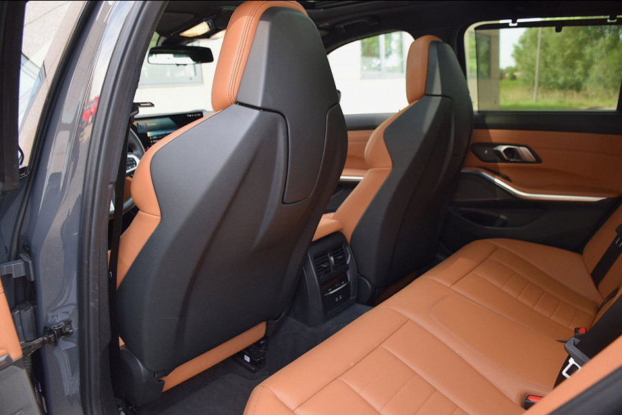 BMW 3 Serie Touring 330e*M-Pakket*Dak*Trekhaak*140Dkm*Keyless*2023*Dravit Grau*INDIVIDUAL*
