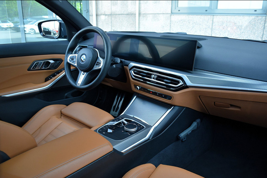 BMW 3 Serie Touring 330e*M-Pakket*Dak*Trekhaak*140Dkm*Keyless*2023*Dravit Grau*INDIVIDUAL*