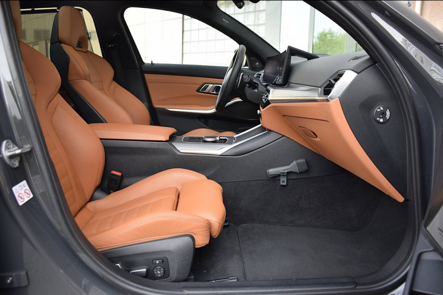 BMW 3 Serie Touring 330e*M-Pakket*Dak*Trekhaak*140Dkm*Keyless*2023*Dravit Grau*INDIVIDUAL*