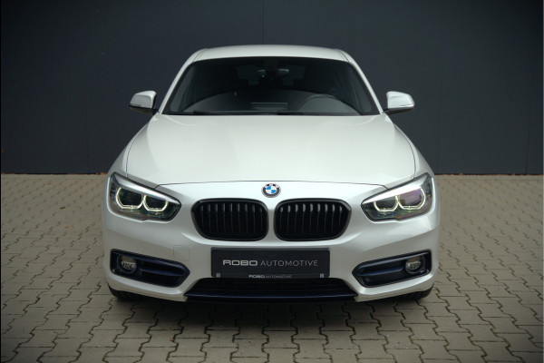 BMW 1-serie 118i Sport Line Edition | Stoelverwarming | Cruise Control | Parkeersensoren | Navigatie | Groot Scherm | Digitale Tellers | Automaat | Keyless | Trekhaak | LED