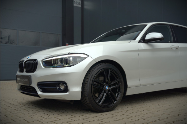 BMW 1-serie 118i Sport Line Edition | Stoelverwarming | Cruise Control | Parkeersensoren | Navigatie | Groot Scherm | Digitale Tellers | Automaat | Keyless | Trekhaak | LED