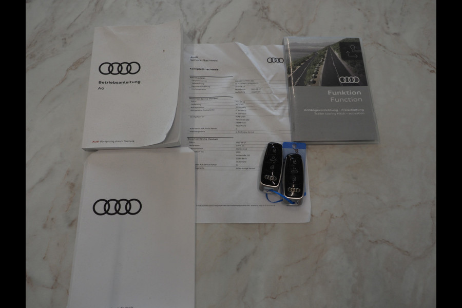 Audi A6 Avant 55 TFSI e quattro Full Black | Trekhaak | Keyless | Adaptive Cruise | Camera | Memory | Stoelverwarming | Carplay