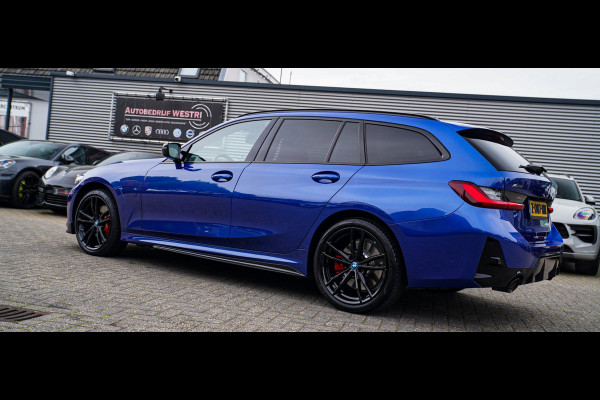 BMW 3 Serie Touring 330e xDrive M-pakket | Panorama | HuD | Sfeerverlichting | BMW LED | Camera | Portimao blau metallic |