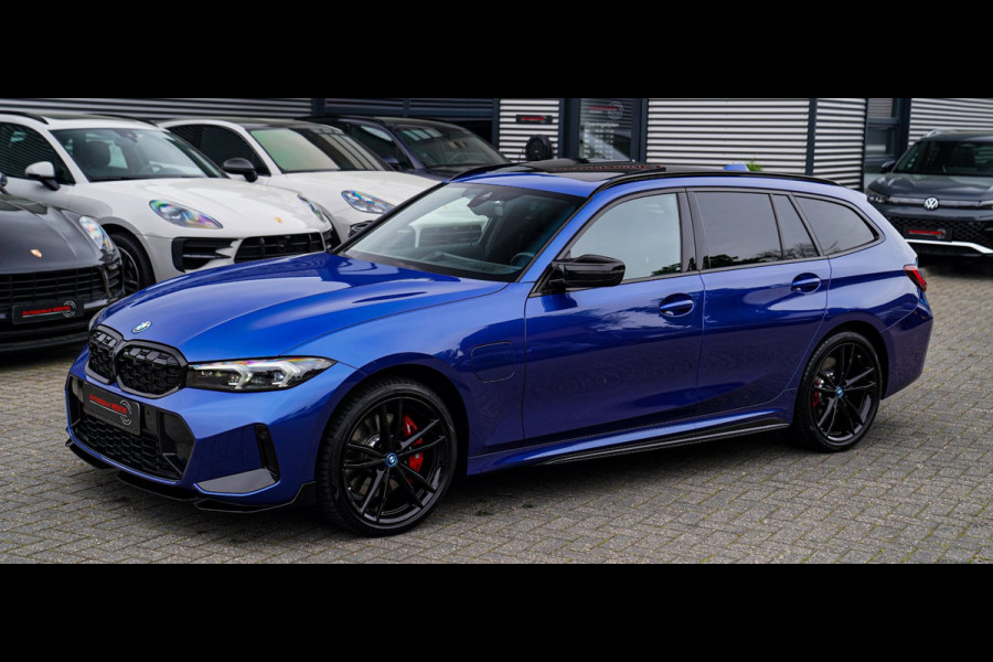 BMW 3 Serie Touring 330e xDrive M-pakket | Panorama | HuD | Sfeerverlichting | BMW LED | Camera | Portimao blau metallic |