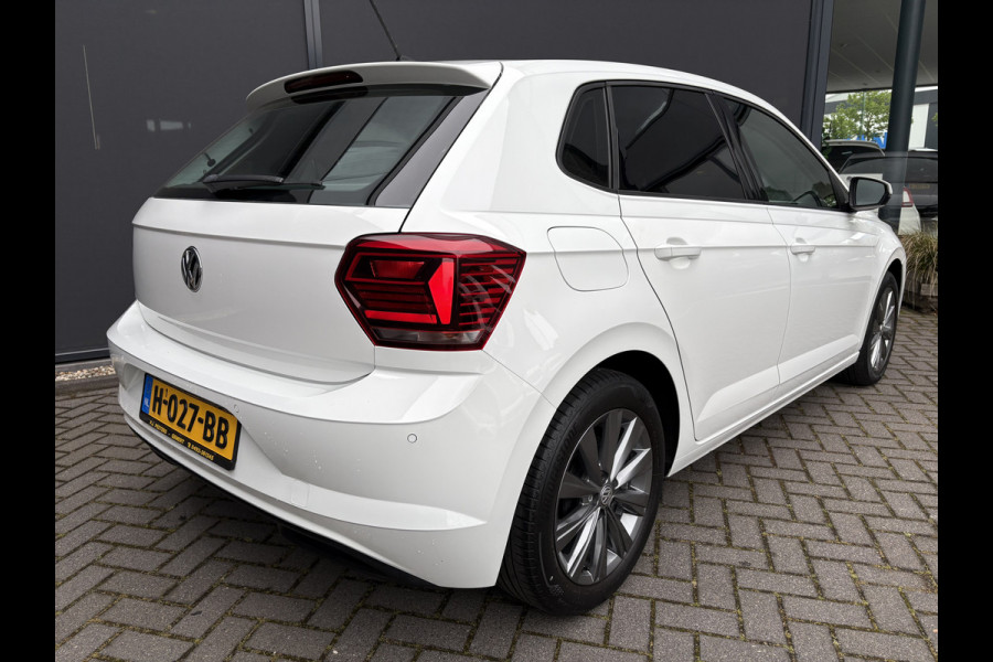 Volkswagen Polo 1.0 TSI Highline Airco - Apple carplay - Navigatie - Parkeersensoren - Parkeer assistent - Cruise control - Licht metalen velgen 16 inch - Lederen versnellingspook - Bluetooth - Led verlichting - Radio - Start/stop systeem - Stuur leder - Stuur multifunctioneel - Elektrische ramen