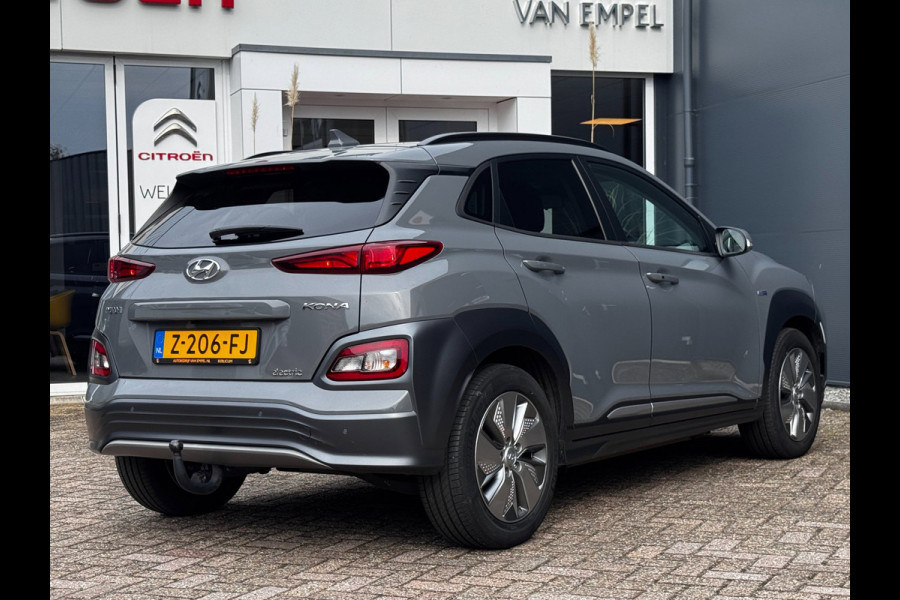Hyundai Kona EV Comfort Smart 39 kWh | 100% SOH | Trekhaak | Camera | Stoel + Stuurverwarming | Navigatie