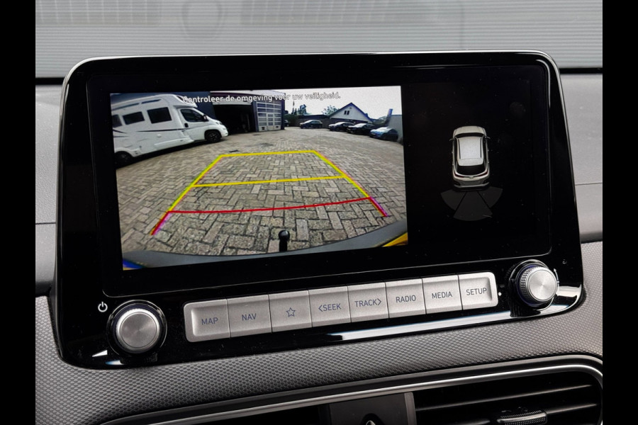 Hyundai Kona EV Comfort Smart 39 kWh | 100% SOH | Trekhaak | Camera | Stoel + Stuurverwarming | Navigatie