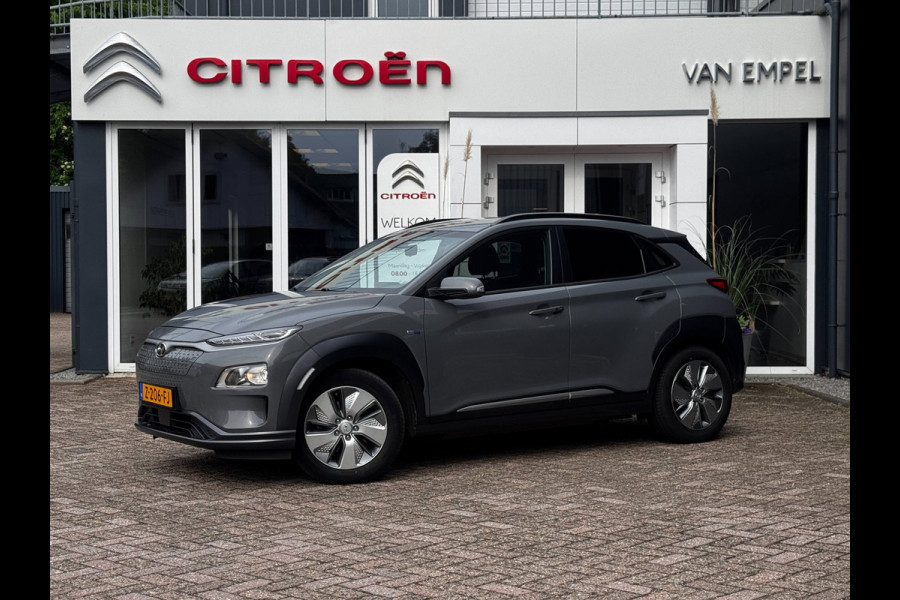 Hyundai Kona EV Comfort Smart 39 kWh | 100% SOH | Trekhaak | Camera | Stoel + Stuurverwarming | Navigatie