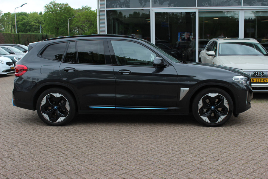 BMW iX3 High Executive 80 kWh / SoH 94,9% / Trekhaak / Panoramadak / 360Camera / Head-up / 20'' / Leder / Harman Kardon / Navigatie / Memory seats / Dodehoek / DAB / Stoelverwarming / Cruise Control Adaptief