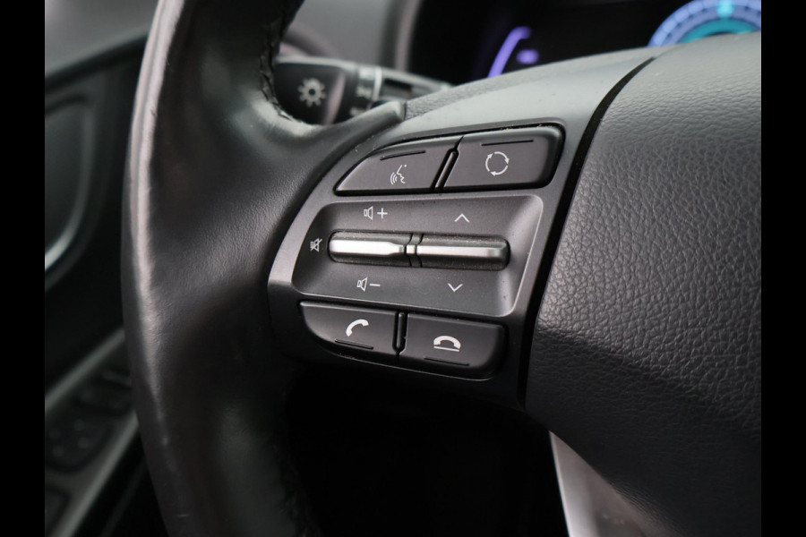 Hyundai Kona EV PREMIUM SKY 64 kWh 100% SOH *CERAMIC BLUE* + SCHUIFDAK | STOELVERW. V+A | STOELVENTILATIE | KRELL