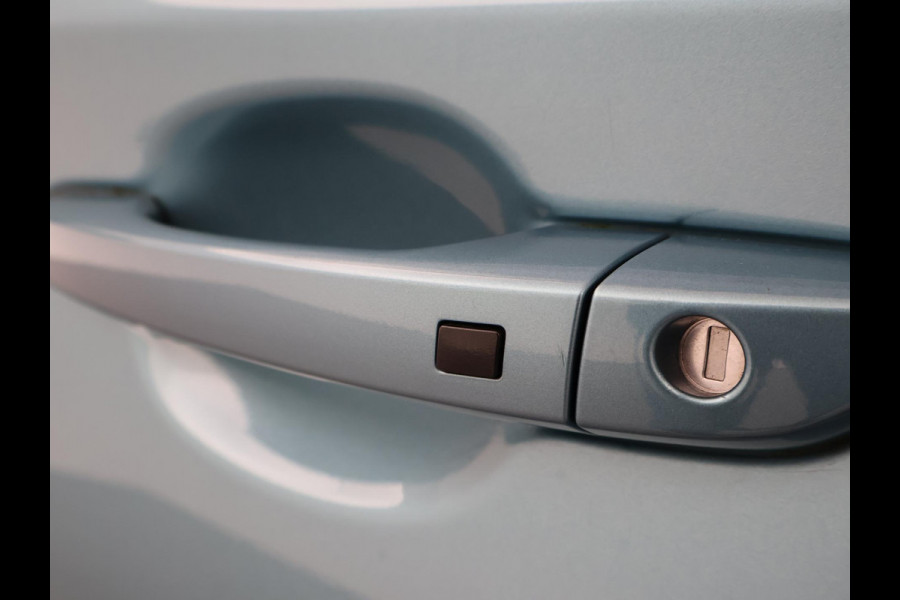 Hyundai Kona EV PREMIUM SKY 64 kWh 100% SOH *CERAMIC BLUE* + SCHUIFDAK | STOELVERW. V+A | STOELVENTILATIE | KRELL