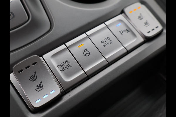 Hyundai Kona EV PREMIUM SKY 64 kWh 100% SOH *CERAMIC BLUE* + SCHUIFDAK | STOELVERW. V+A | STOELVENTILATIE | KRELL