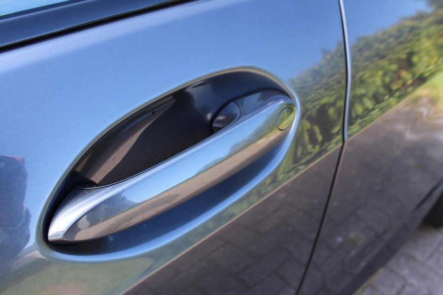 BMW 1-serie 118i Business Edition Plus 136pk Automaat | M -Sport | Navi | Stoelverwarming | PDC |