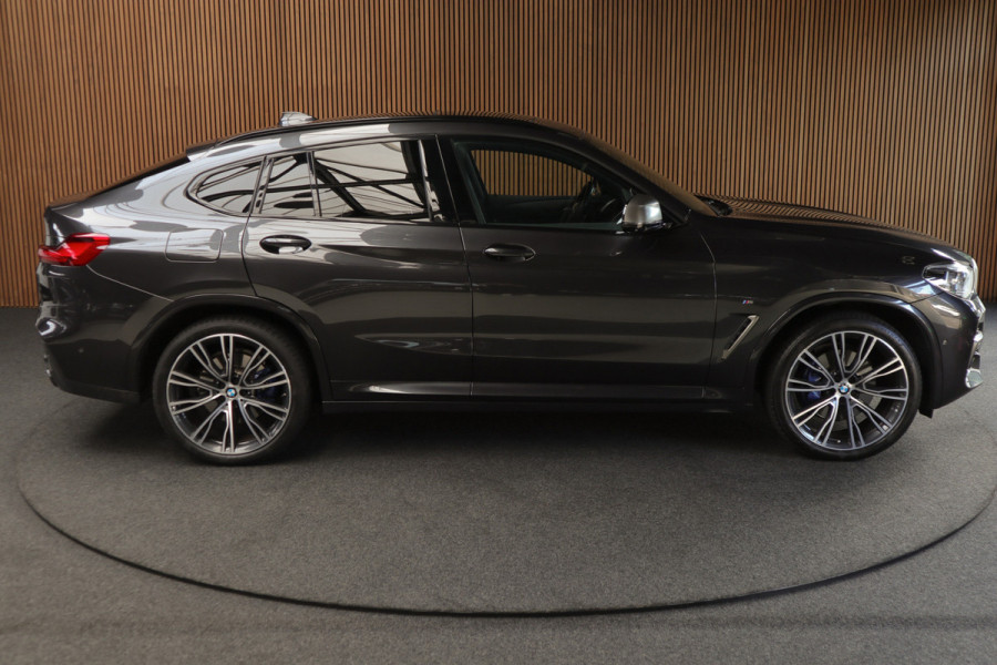 BMW X4 M40i HUD Panodak 360° Harman K Leer ACC Navi Keyless Entry & Go Elektr. uitklapbare trekhaak Elektr. bedienbare achterklep Memory seats Climate voor & achter PDC Zwarte hemelbekleding 21 inch LM v