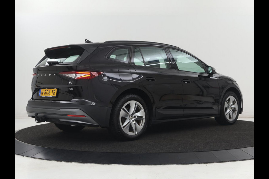 Škoda ENYAQ iV 60 | SOH 91,6% | Trekhaak | Half leder | Carplay | Navigatie | Full LED | 19'' | Cruise control | Sfeerverlichting | Parkeerhulp | Climate control