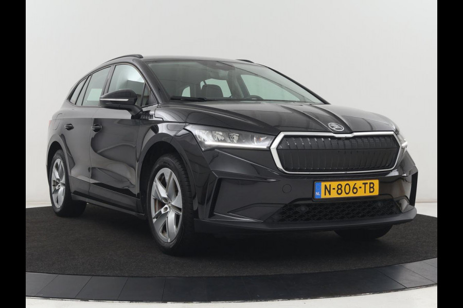 Škoda ENYAQ iV 60 | SOH 91,6% | Trekhaak | Half leder | Carplay | Navigatie | Full LED | 19'' | Cruise control | Sfeerverlichting | Parkeerhulp | Climate control