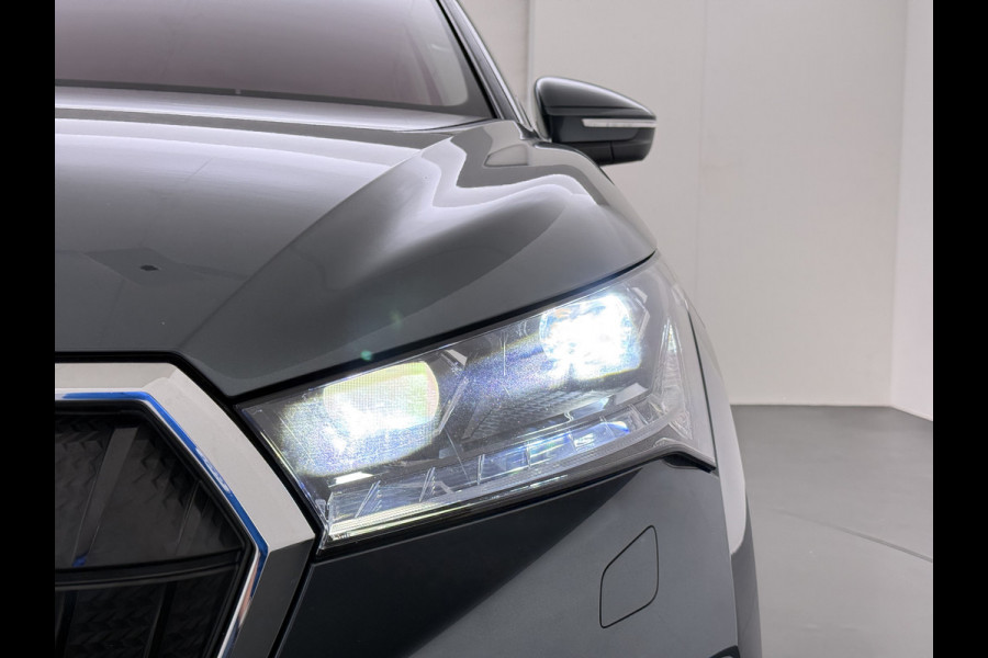 Škoda ENYAQ iV 80 Warmtepomp Trekhaak Leder Adap.Demping Panoramadak Head-Up 360°Camera Navi 3-Zone Ecc Apple Carplay Android Auto Pdc Stoel+Achterbankverwarming Led-Matrix Lmv 21" Elek.Achterklep Memory 1.000KG Trekgewicht Dealeronderhouden Zeer Compleet