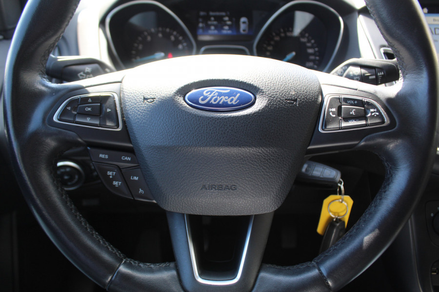 Ford FOCUS Wagon 1.0 Lease Edition , 125pk Airco , Cruise, Trekhaak ,Stoel,Stuur en Voorruitverwarming LM velgen , Bluetooth , Navigatie