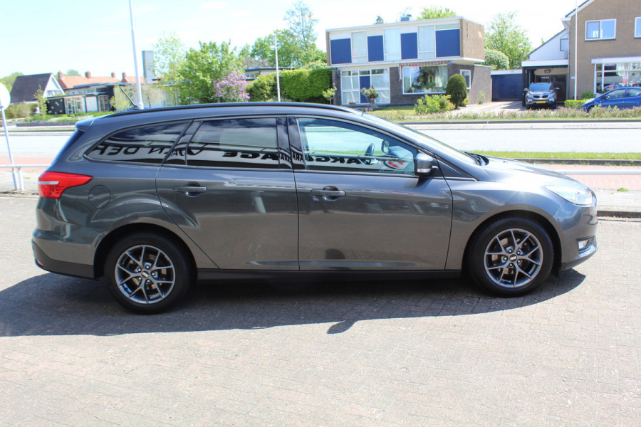 Ford FOCUS Wagon 1.0 Lease Edition , 125pk Airco , Cruise, Trekhaak ,Stoel,Stuur en Voorruitverwarming LM velgen , Bluetooth , Navigatie