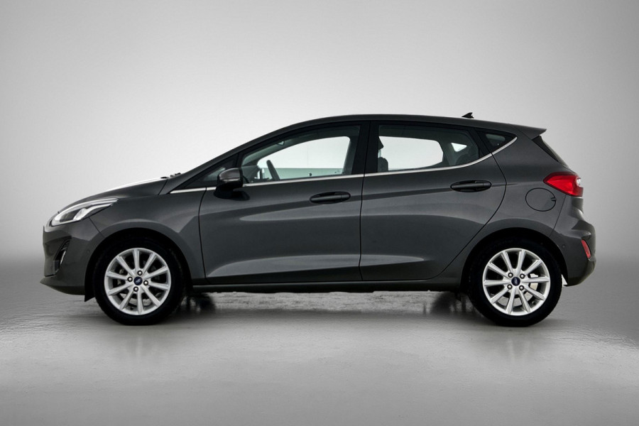 Ford Fiesta 1.0 EcoBoost Titanium (NAVIGATIE, CARPLAY, PARKEERSENSOREN, LED, STUURBEDIENING, 1e EIGENAAR, GOED ONDERHOUDEN)