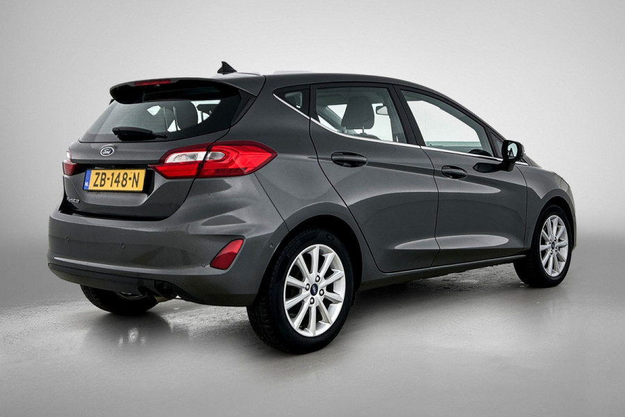 Ford Fiesta 1.0 EcoBoost Titanium (NAVIGATIE, CARPLAY, PARKEERSENSOREN, LED, STUURBEDIENING, 1e EIGENAAR, GOED ONDERHOUDEN)