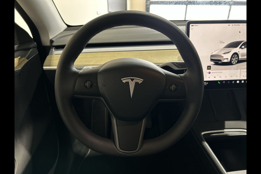 Tesla Model Y RWD 58 kWh | Leder Interieur | Houten afwerking | Verwarmde stoelen en stuur |  Soh (batterijcheck) Waarde 95,1 %