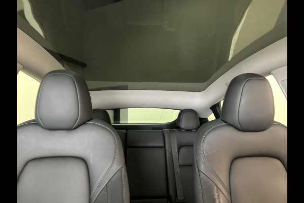 Tesla Model Y RWD 58 kWh | Leder Interieur | Houten afwerking | Verwarmde stoelen en stuur |  Soh (batterijcheck) Waarde 95,1 %