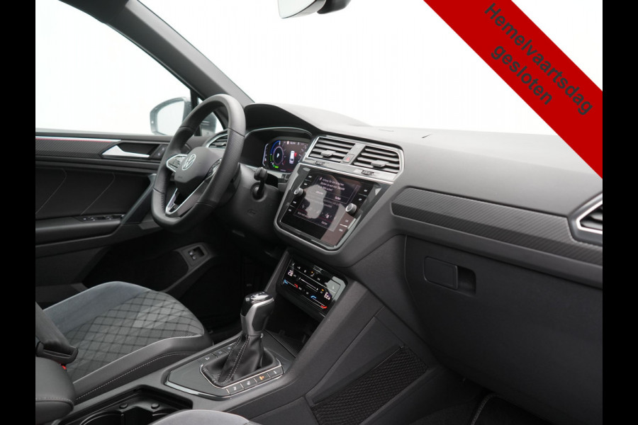 Volkswagen Tiguan 1.4 TSI eHybrid R-Line PHEV 245pk Dealer O.H | Trekhaak Af Fabriek | Adaptive Cruise | IQ Light | Adaptive Onderstel | Camera | Alcantara Sportstoelen & Stuur Verwarmd | Blis | Keyless | Sfeerverlichting | Virtual | Navigatie | DAB | 20"L.M | Plug In Hybrid |