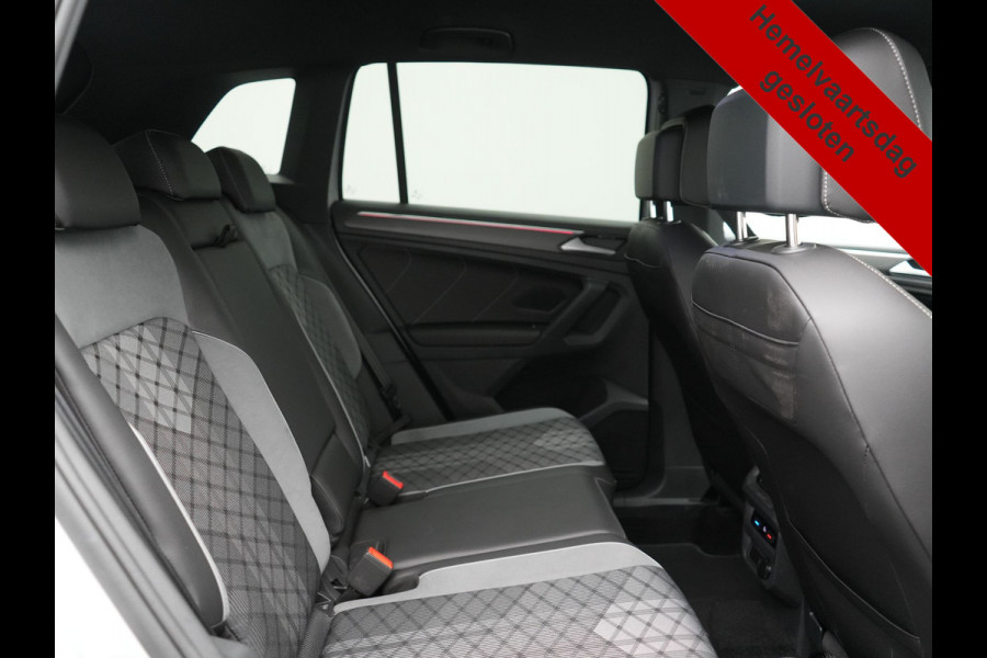 Volkswagen Tiguan 1.4 TSI eHybrid R-Line PHEV 245pk Dealer O.H | Trekhaak Af Fabriek | Adaptive Cruise | IQ Light | Adaptive Onderstel | Camera | Alcantara Sportstoelen & Stuur Verwarmd | Blis | Keyless | Sfeerverlichting | Virtual | Navigatie | DAB | 20"L.M | Plug In Hybrid |