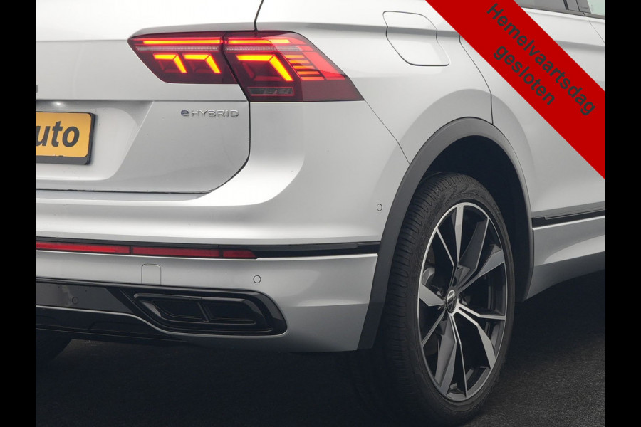 Volkswagen Tiguan 1.4 TSI eHybrid R-Line PHEV 245pk Dealer O.H | Trekhaak Af Fabriek | Adaptive Cruise | IQ Light | Adaptive Onderstel | Camera | Alcantara Sportstoelen & Stuur Verwarmd | Blis | Keyless | Sfeerverlichting | Virtual | Navigatie | DAB | 20"L.M | Plug In Hybrid |