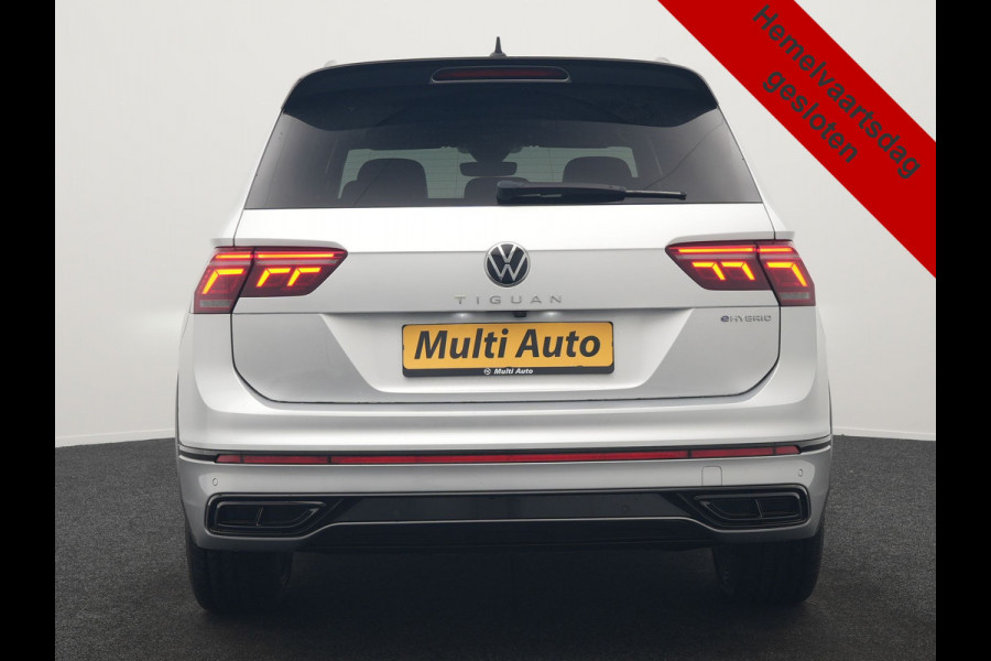 Volkswagen Tiguan 1.4 TSI eHybrid R-Line PHEV 245pk Dealer O.H | Trekhaak Af Fabriek | Adaptive Cruise | IQ Light | Adaptive Onderstel | Camera | Alcantara Sportstoelen & Stuur Verwarmd | Blis | Keyless | Sfeerverlichting | Virtual | Navigatie | DAB | 20"L.M | Plug In Hybrid |