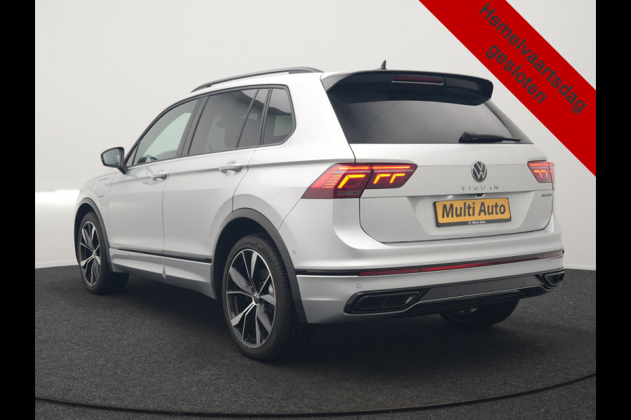 Volkswagen Tiguan 1.4 TSI eHybrid R-Line PHEV 245pk Dealer O.H | Trekhaak Af Fabriek | Adaptive Cruise | IQ Light | Adaptive Onderstel | Camera | Alcantara Sportstoelen & Stuur Verwarmd | Blis | Keyless | Sfeerverlichting | Virtual | Navigatie | DAB | 20"L.M | Plug In Hybrid |