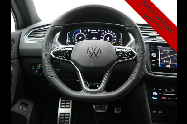 Volkswagen Tiguan 1.4 TSI eHybrid R-Line PHEV 245pk Dealer O.H | Trekhaak Af Fabriek | Adaptive Cruise | IQ Light | Adaptive Onderstel | Camera | Alcantara Sportstoelen & Stuur Verwarmd | Blis | Keyless | Sfeerverlichting | Virtual | Navigatie | DAB | 20"L.M | Plug In Hybrid |