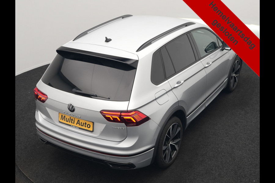 Volkswagen Tiguan 1.4 TSI eHybrid R-Line PHEV 245pk Dealer O.H | Trekhaak Af Fabriek | Adaptive Cruise | IQ Light | Adaptive Onderstel | Camera | Alcantara Sportstoelen & Stuur Verwarmd | Blis | Keyless | Sfeerverlichting | Virtual | Navigatie | DAB | 20"L.M | Plug In Hybrid |
