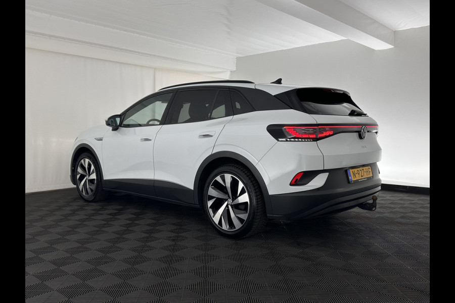 Volkswagen ID.4 Business 77 kWh [ 3-Fase-11kW ] {SOH-83%} (INCL.BTW) *LEATHER-FABRIC | ADAPTIVE-CRUISE | FULL-LED | HEATED-COMFORTSEATS | KEYLESS | CAMERA | DIGI-COCKPIT | DAB | NAVI-FULLMAP | PRIVACY-GLASS | ECC | PDC | TOWBAR | 19''ALU*