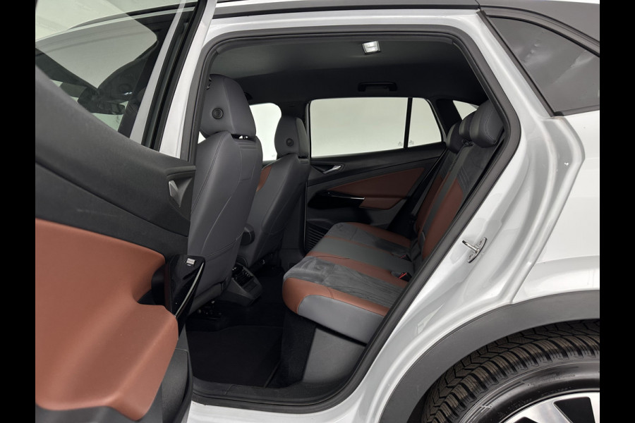 Volkswagen ID.4 Business 77 kWh [ 3-Fase-11kW ] {SOH-83%} (INCL.BTW) *LEATHER-FABRIC | ADAPTIVE-CRUISE | FULL-LED | HEATED-COMFORTSEATS | KEYLESS | CAMERA | DIGI-COCKPIT | DAB | NAVI-FULLMAP | PRIVACY-GLASS | ECC | PDC | TOWBAR | 19''ALU*