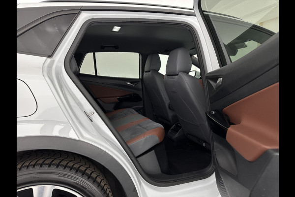 Volkswagen ID.4 Business 77 kWh [ 3-Fase-11kW ] {SOH-83%} (INCL.BTW) *LEATHER-FABRIC | ADAPTIVE-CRUISE | FULL-LED | HEATED-COMFORTSEATS | KEYLESS | CAMERA | DIGI-COCKPIT | DAB | NAVI-FULLMAP | PRIVACY-GLASS | ECC | PDC | TOWBAR | 19''ALU*