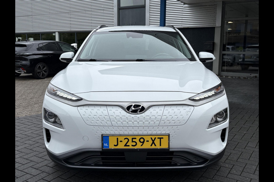 Hyundai Kona EV Fashion 64 kWh | Trekhaak | Warmtepomp | Head-Up | 3Fase | Krell | Dodehoeksensoren | Camera |