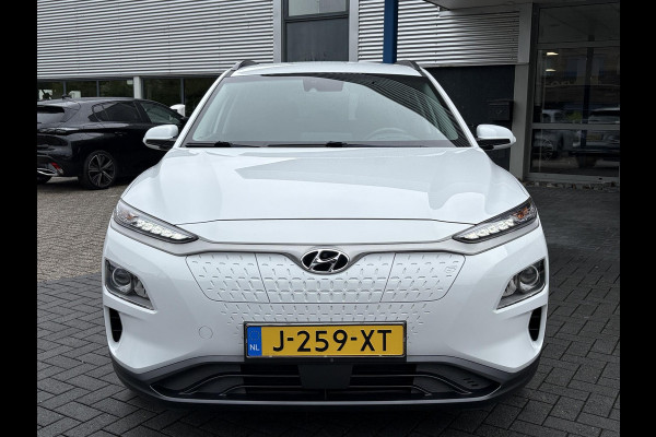 Hyundai Kona EV Fashion 64 kWh | Trekhaak | Warmtepomp | Head-Up | 3Fase | Krell | Dodehoeksensoren | Camera |