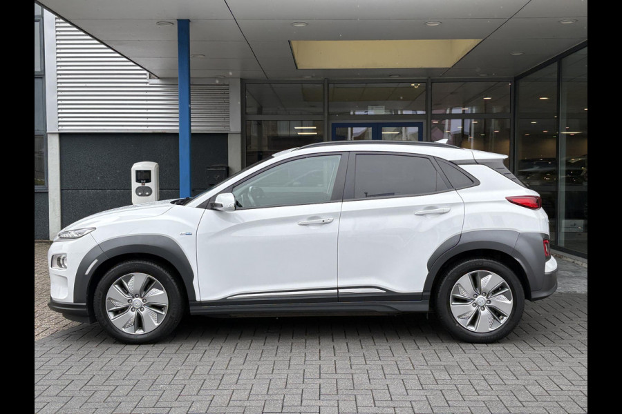 Hyundai Kona EV Fashion 64 kWh | Trekhaak | Warmtepomp | Head-Up | 3Fase | Krell | Dodehoeksensoren | Camera |