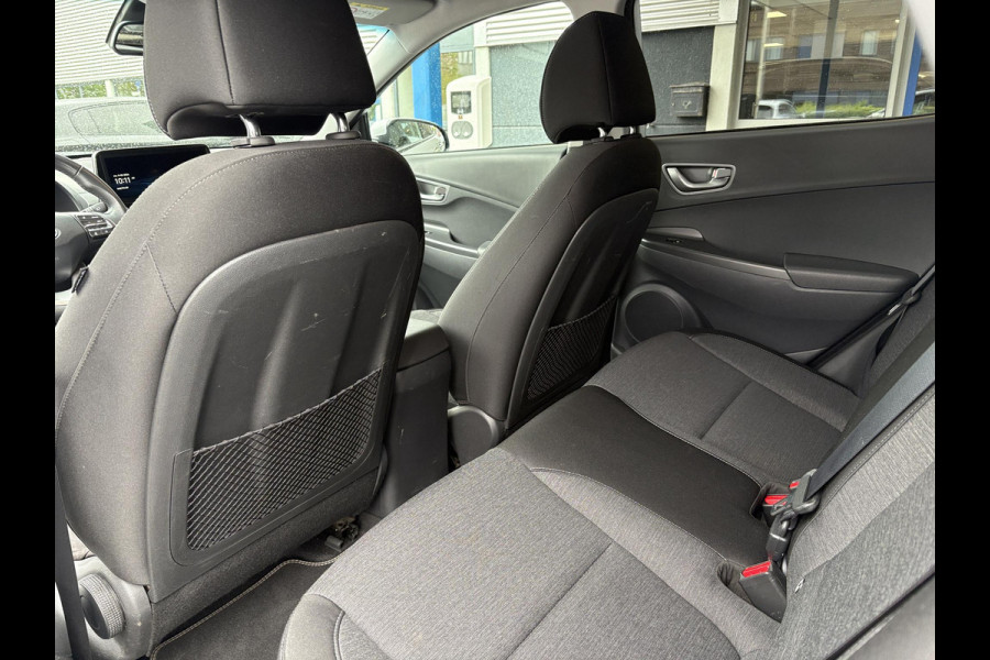 Hyundai Kona EV Fashion 64 kWh | Trekhaak | Warmtepomp | Head-Up | 3Fase | Krell | Dodehoeksensoren | Camera |